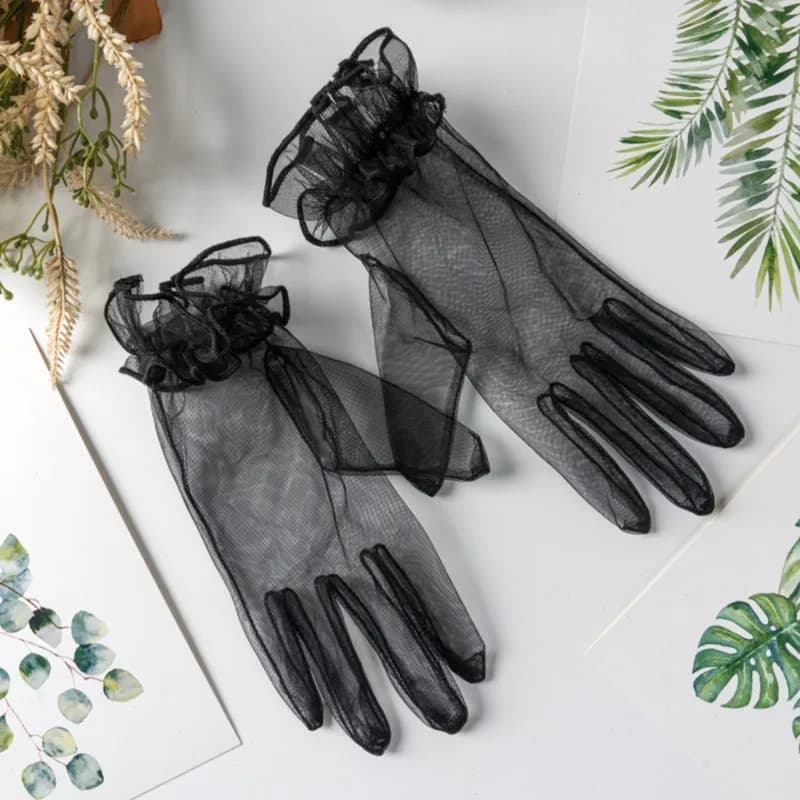 Перчатки прозрачные с оборками черные